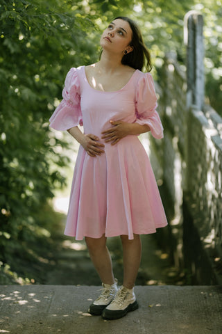 Blossom Dress – front view – round neckline, puff sleeves, flared skirt, light pink cotton – Cori Tailor