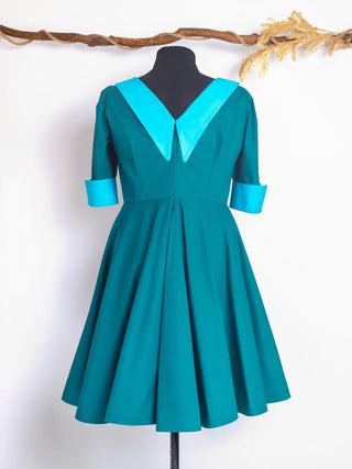 Back view of the Daphne Dress by Cori Tailor — vintage-inspired teal dress with a dramatic contrast collar in turquoise and a clean back finish.