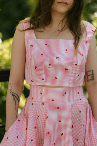 Front close-up of Lolita Set featuring cherry gingham crop top and high-waisted skirt — Cori Tailor summer two-piece set.